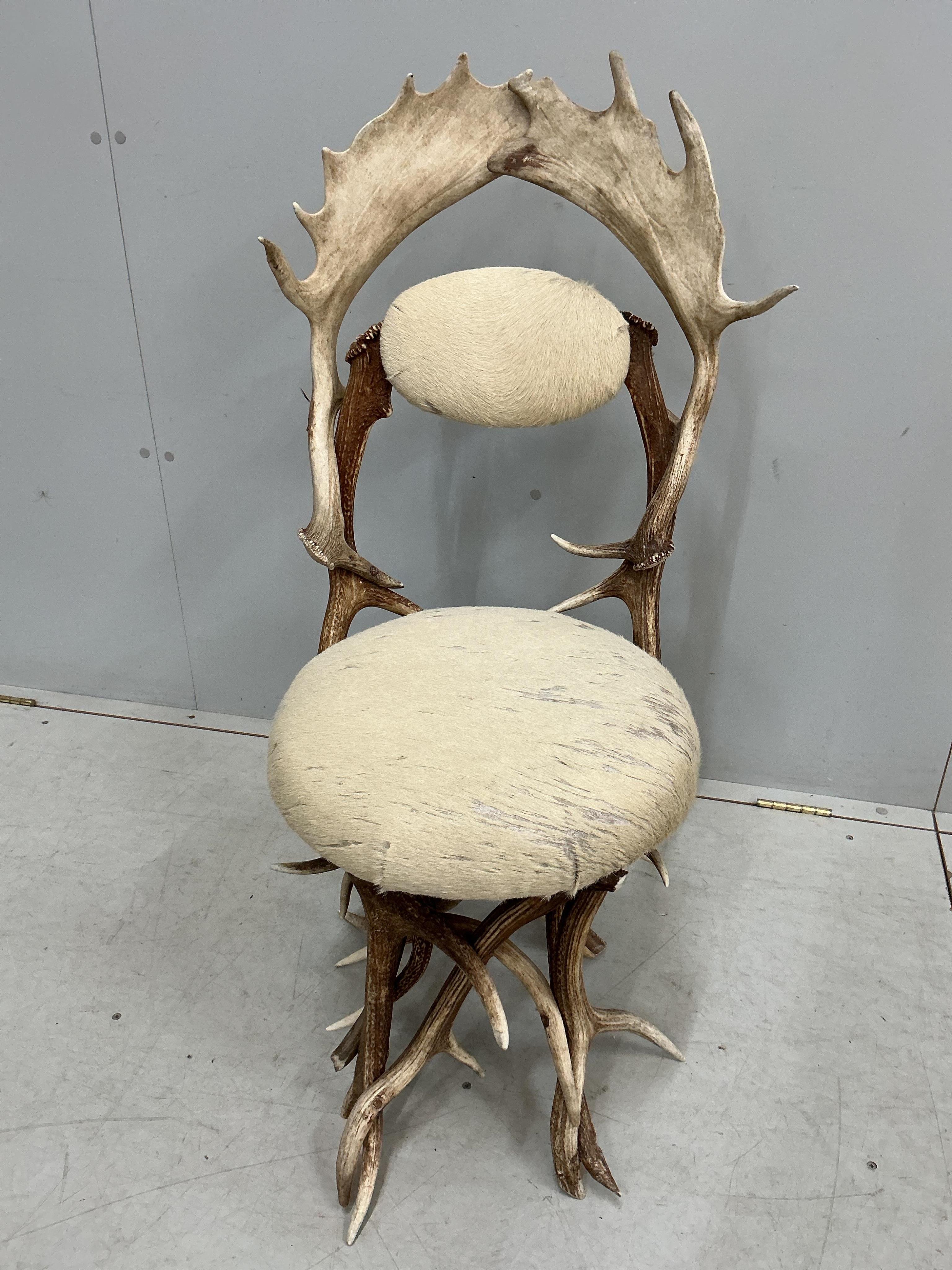 Danilo Shirato for Alps Atmosphere, Sarl, a pair of Italian ‘Fallen Antler’ side chairs with blond skin seats, width 50cm, depth 44cm, height 101cm